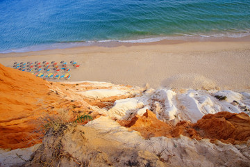 Aerial view on the beach Praia da Falesia Barranco das Belharucas. Region Faro, Algarve, Portugal.