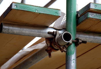 Detail of scaffolding pole and clips.