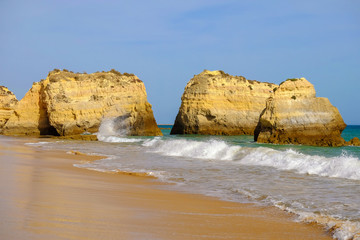 View on beautiful cliffs in Algarve. Beach Careanosy in Portimao. Vacation in Portugal.