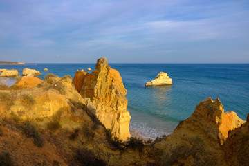View on the beach Careanosy in Portimao with beautiful cliffs. Vacation in Portugal.