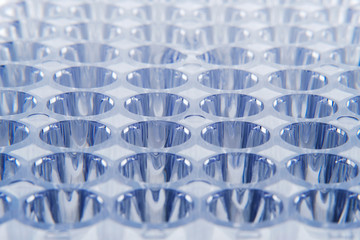 Abstract geometrical cell pattern of plastic container