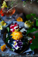 goat cheese balls with edible  flowers.selective focus