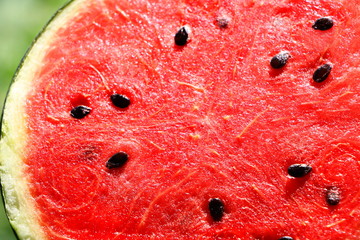 close up inside of watermelon, red surface with black seeds have copy space for put text