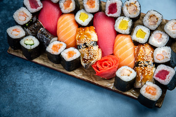 Big set of colorful sushi rolls