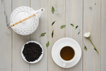 Fototapeta na wymiar Top view cup of tea with teapot