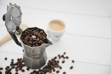 Coffee maker full of coffee grains