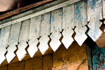 carved wooden decorations on the old house