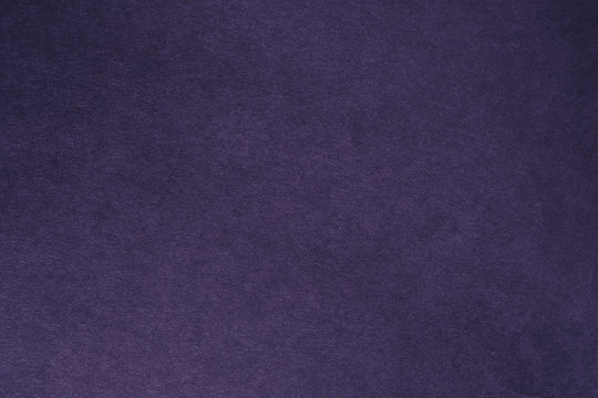 Plum blue felt texture abstract art background. Solid color construction paper surface. Empty space.