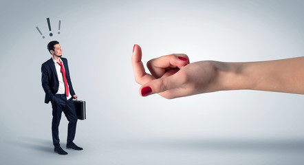 Businessman in an affair with kisses on his face and question concept
