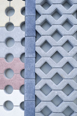 Various colors and shapes of concrete blocks in store