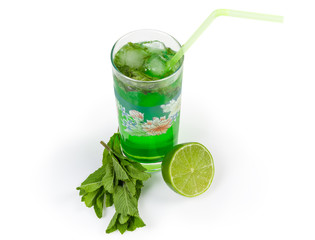 Cold mint drink, mint twigs and lime on white background