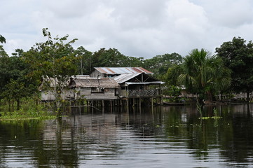A poor-looking indigenous village in the rain forest near the Amazon river, Colombia