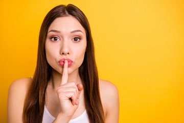 Portrait of cunning cute charming lady dont want share private information say shh she her white...