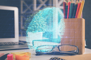 Fingerprint drawing with glasses on the table background. Concept of security. Double exposure.