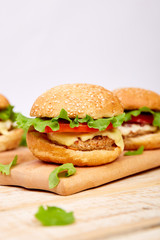 Craft beef burger  on wooden table on light background
