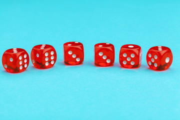 Gaming dices on blue background. Game concept.