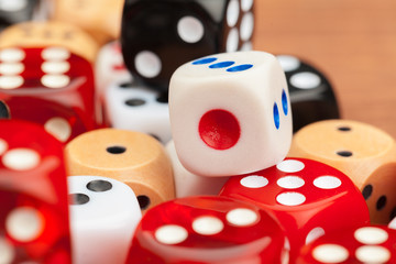Dice on a wooden table. Concept for business risk.