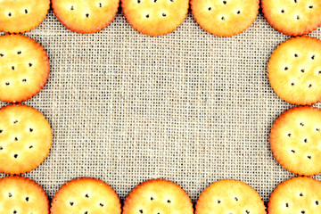 Salty, crispy and tasty biscuits frame for kids greetings or menu card concept