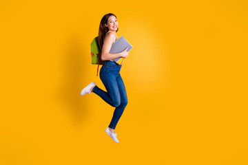 Full length body size view photo of cheerful lovely funny funky lady enjoy rejoice content dressed she her light-colored modern clothing sneakers isolated trendy white colorful yellow background