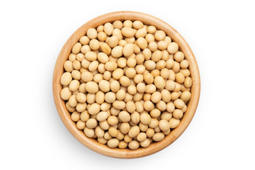 Soybeans in wooden bowl isolated on white background. top view.