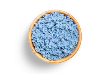 Purple rice in a wooden bowl isolated on a white background, with clipping path.