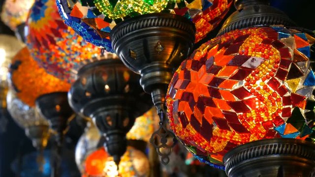 Multi-colored Turkish mosaic lamps on the ceiling market in the famous Grand Bazaar in Istanbul, Turkey