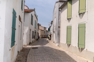 Fototapeta na wymiar typical authentic cobblestone street in Saint Martin de Re France