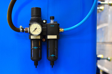 Water pressure sensor in the water supply system. Pressure gauge mounted on piping system with...
