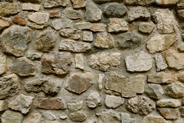 Ancien mur de pierre ocre.