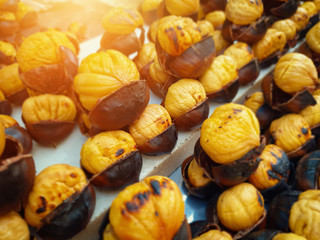 roasted sweet chestnuts on counter on street