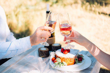 Couple of lovers celebrating their engagement at the dinner table