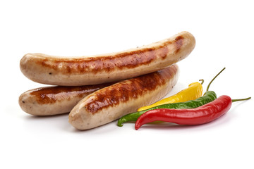 Grilled Thuringian Sausages, close-up, isolated on white background