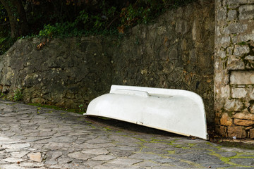boat upside down on boulevard in Opatija, Croatia