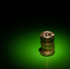 Bitcoins Stacked Close up on a Green Bull Run, Uptrend Background