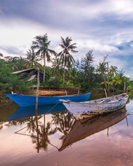 Fototapeta premium The Couple Traditional boat at bintan island Indonesia