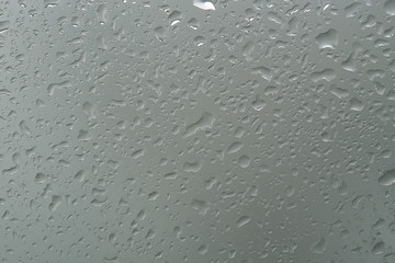 wet glass background condensate / abstract rain, drops texture on transparent glass