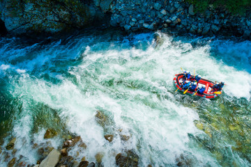White water rafting on alpine river - obrazy, fototapety, plakaty