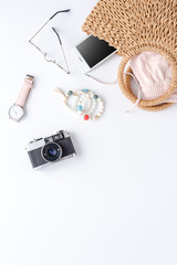 Summer women’s accessories on white background