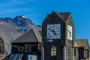 Fototapeta na wymiar View of the facade of the building with a clock, Queenstown, New Zealand.