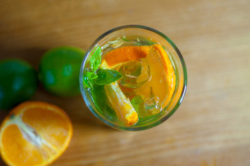 Summer refreshing iced drink with orange