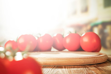 Desk of free space and summer background of tomatoes. 