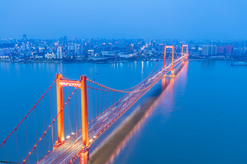 Island Yangtze river bridge. Located in wuhan, the largest city in central China. The Yangtze river is the longest river in China. Modern traffic background.