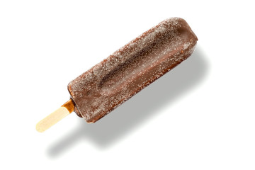 Ice cream lolly in chocolate glaze close-up with condensate and icing frost, with shadow isolated on white background.