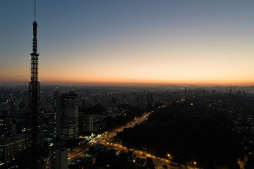 Fototapeta premium Sunset aerial view in São Paulo, Brazil. Great landscape. Explosion of colors on skyline. Business travel. Travel destination.