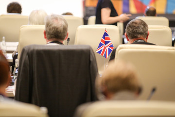 Details with the flag of the United Kingdom during a conference of European Union officials