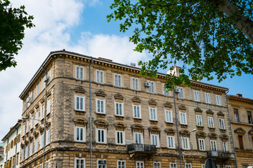 Fototapeta na wymiar apartments in yellow historical building in Rijeka, Istria, Croatia