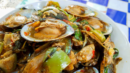 Spicy fried clam fried With eggplant and basil leaves, fresh and delicious red pepper, sea food, Thai food