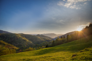 Fototapeta premium Sunset in the mountains landscape. Carpathian, Ukraine.
