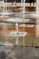 Jets of water and spray of dry fountain close up