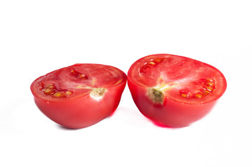 A mature red tomato isolated on a white background. vegetables.Copy space